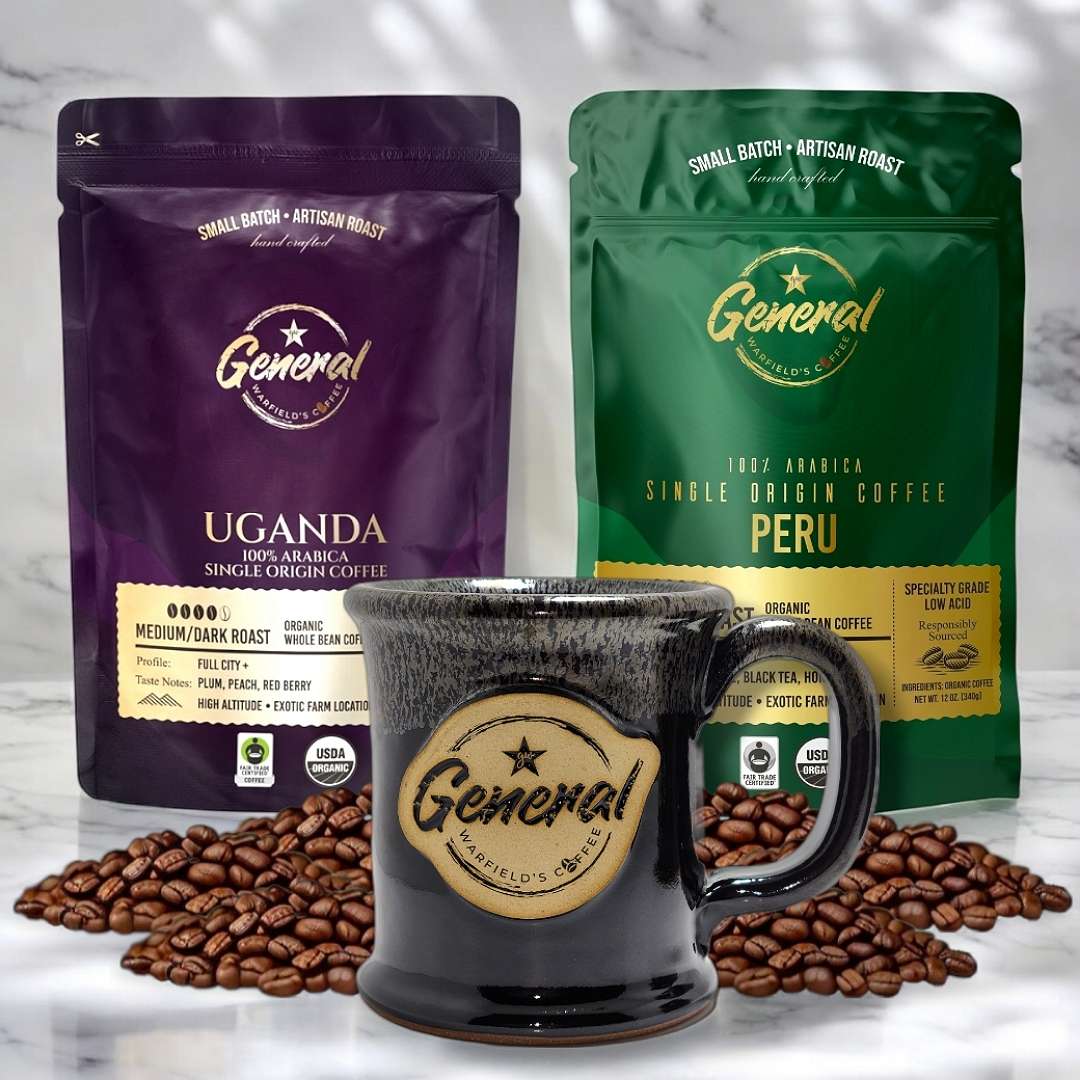 Organic Coffee Brew Bundle featured on marble surface highlighting the Organic certified Peruvian and Ugandan roasts with lead-free and cadmium-free handcrafted 14oz mug.